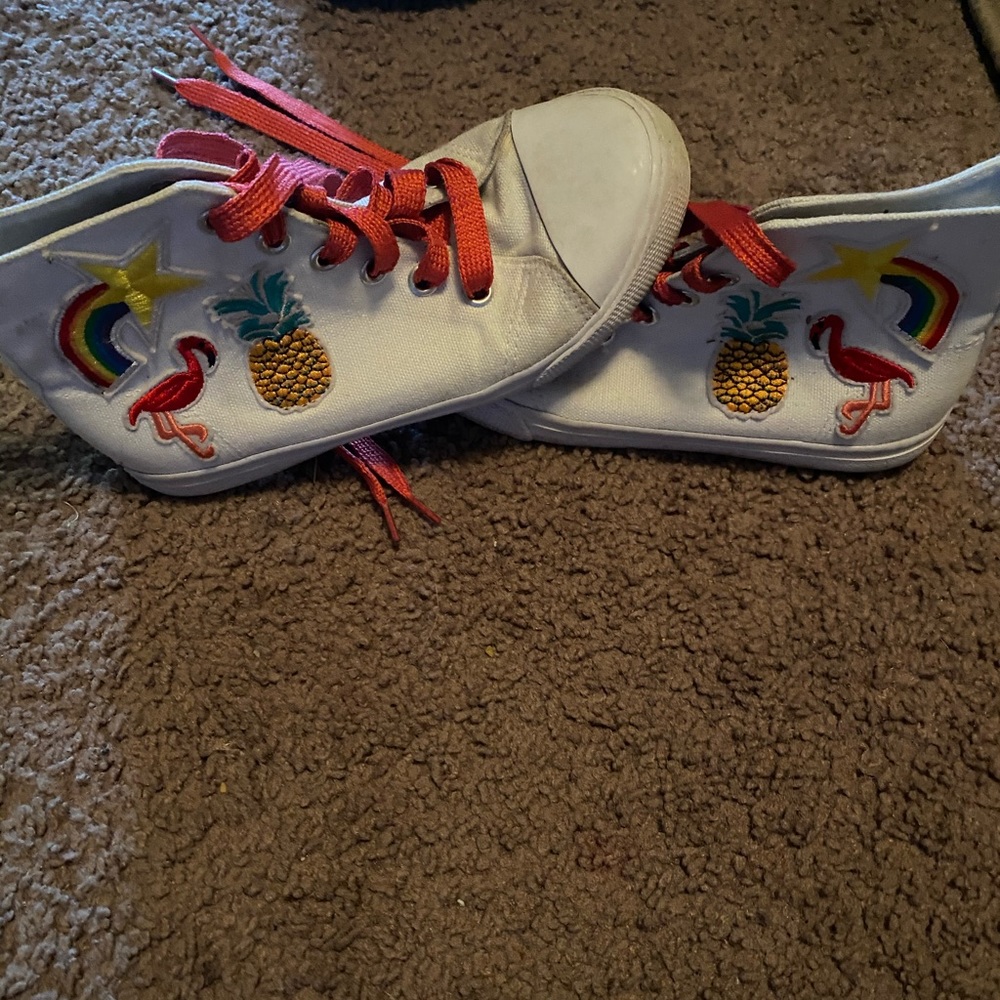 Youth size one cat and Jack high top shoes